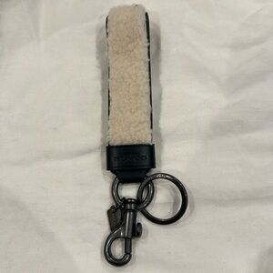 Coach shearling key fob